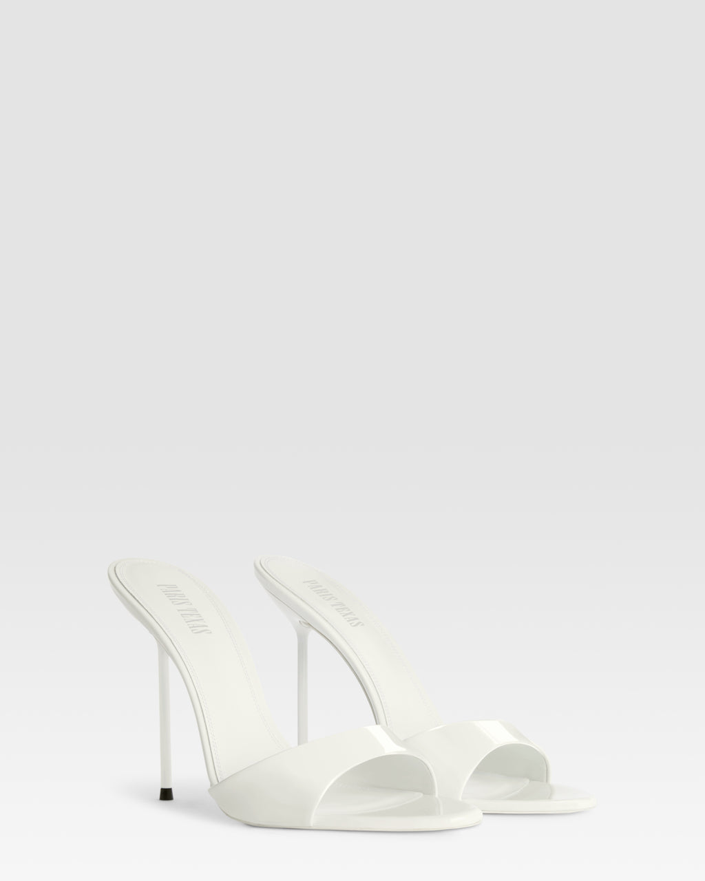 Mules in optic white patent leather