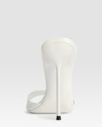 Mules in optic white patent leather