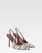 Slingbacks in white and ebony printed cowhide.