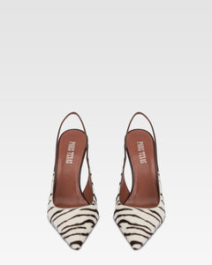 Slingbacks in white and ebony printed cowhide.