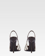 Slingbacks in white and ebony printed cowhide.