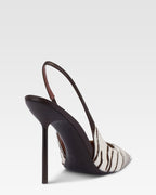 Slingbacks in white and ebony printed cowhide.