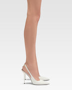 White patent leather slingbacks