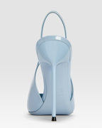 Slingbacks in denim-colored patent leather