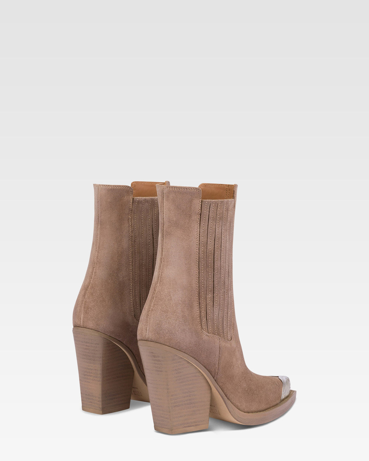 Suede ankle boot with metal toe cap
