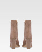 Suede ankle boot with metal toe cap