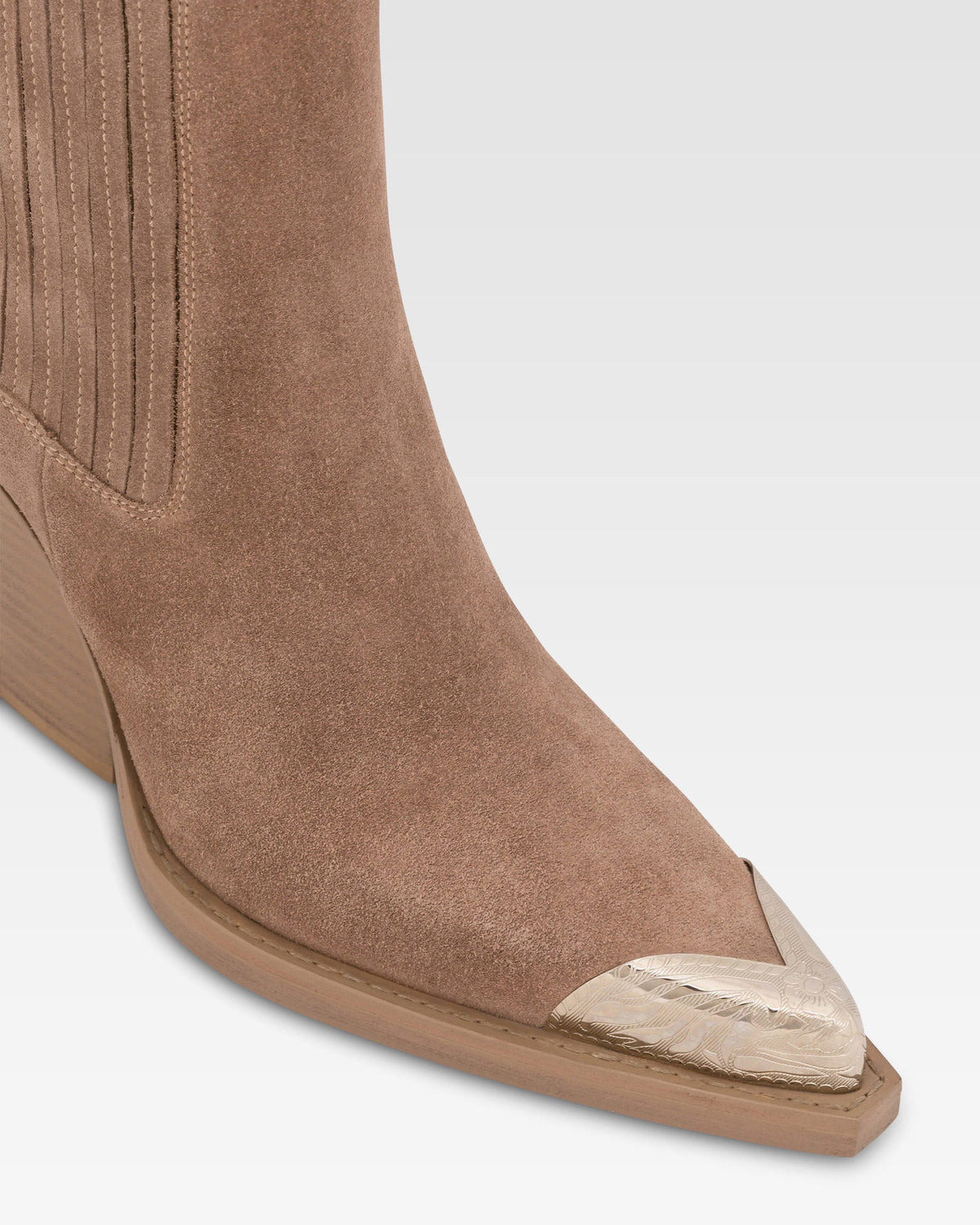 Suede ankle boot with metal toe cap
