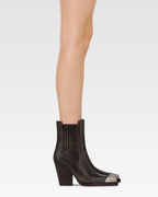 Texan ankle boots in black vintage-effect leather.
