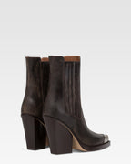 Texan ankle boots in black vintage-effect leather.