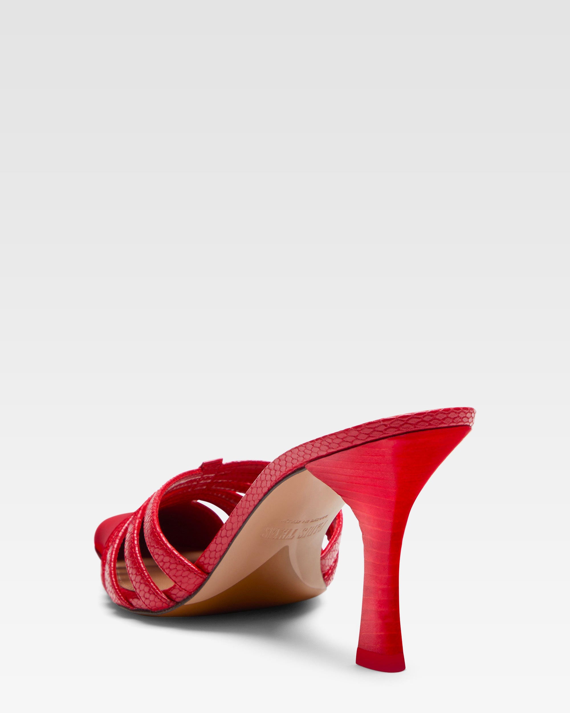 Mule in pelle rossa a ragnetto